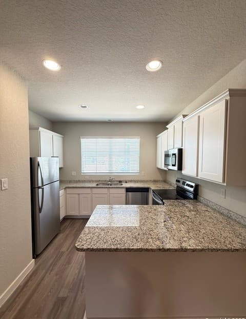 8318 Runner Cove Unit 101 — photo 4